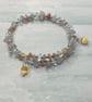 Memory wire bangle with peach moonstone, quartz, amethyst and selenite  - Image 3
