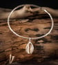 Sterling Silver Bangle With A Cowrie Shell Charm - Image 2
