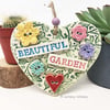 Ceramic heart decoration with button flowers Beautiful garden 