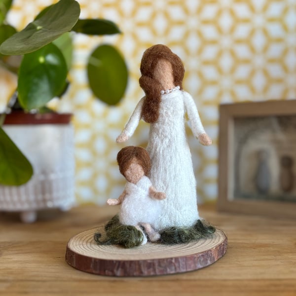 White needlefelted wool woman and child ornament