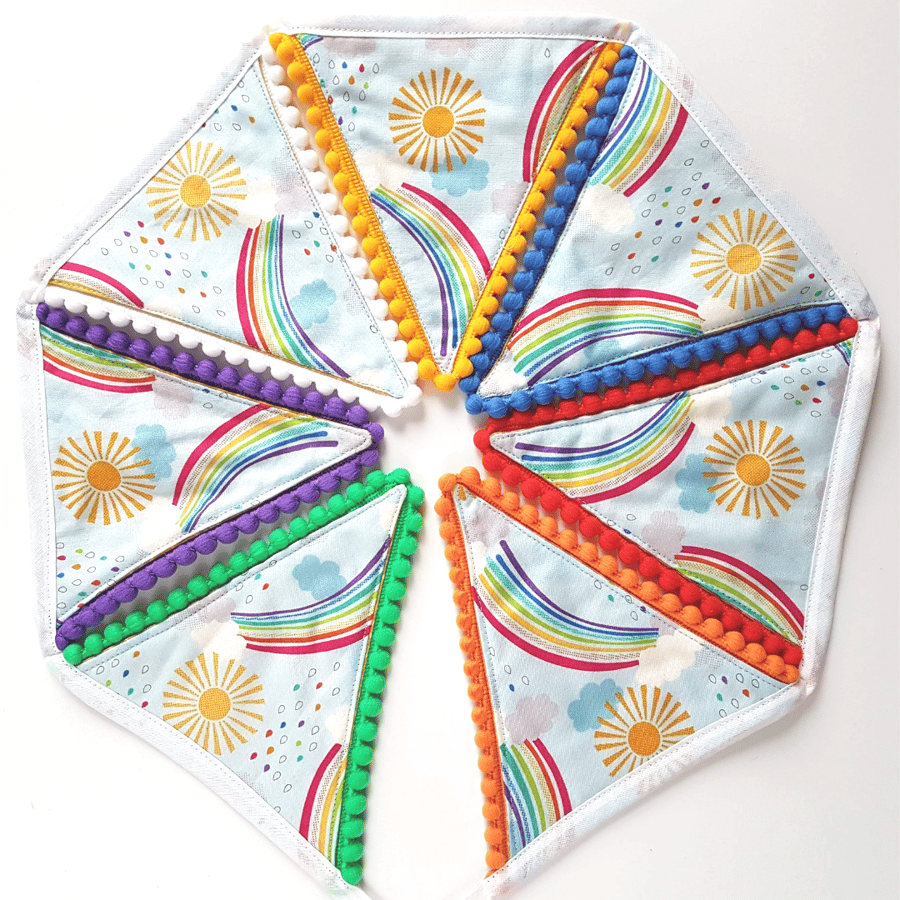 Rainbow bunting with pom pom trim.