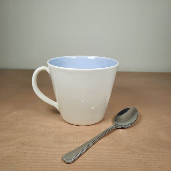 Large pale blue and white porcelain stoneware mug