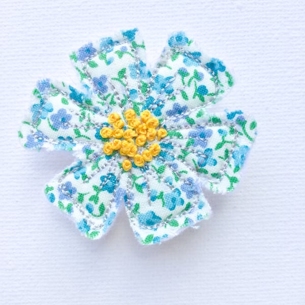 Flower brooch.