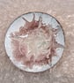 white dish scrolled dark pink and beige