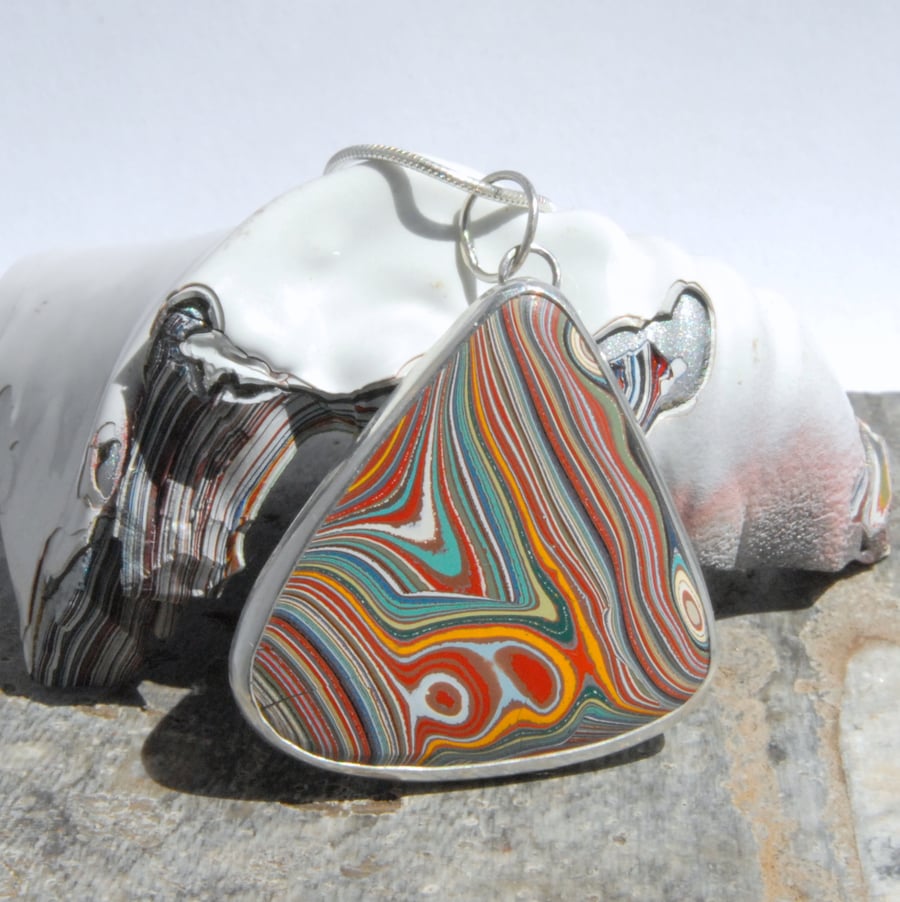 Retro Ford fordite pendant