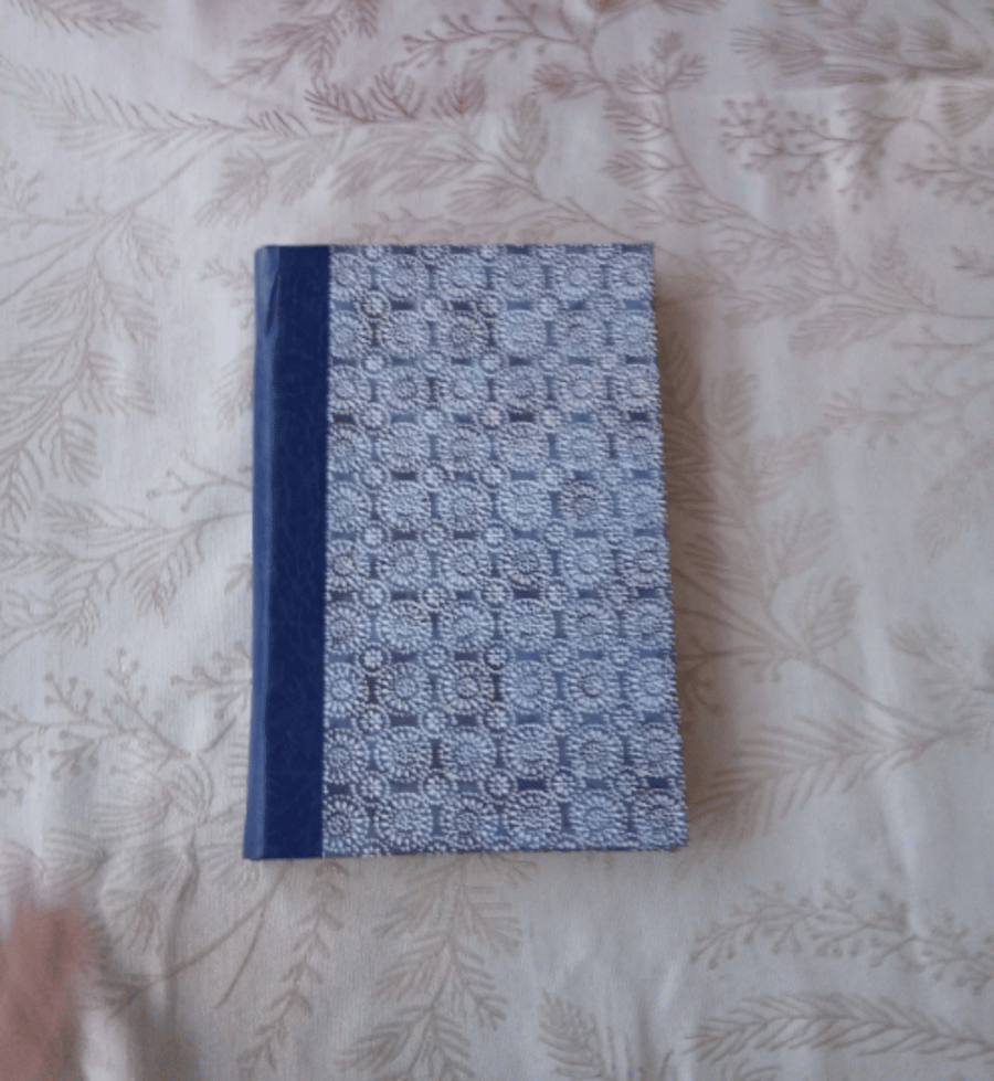 Handbound Journal 100 GSM laid Ingres paper and textured blue pattern cover.
