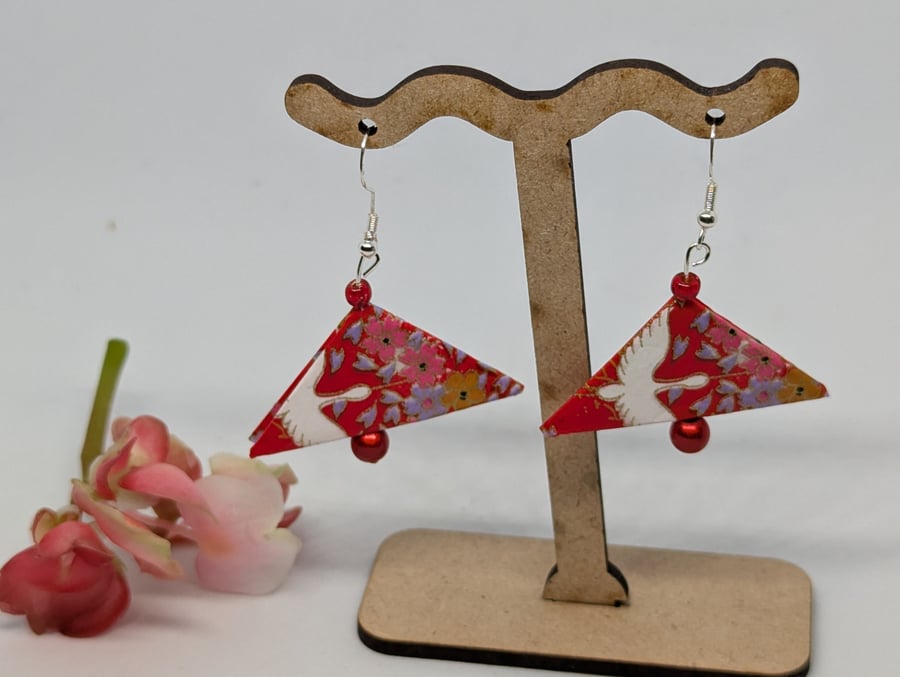 Japanese triangle paper earrings:  traditional geese motif on red background