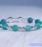 Beaded bracelet with crackle glass and sterling silver green blue stretchy - Image 6