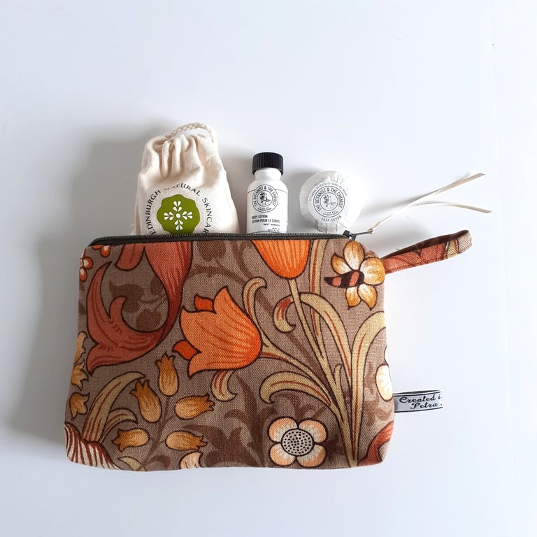 Make up or toiletries bag in a vintage Morris and Co autumnal Golden Lily print.