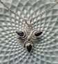 Sterling silver 3 petal flower pendant with blue goldstone 