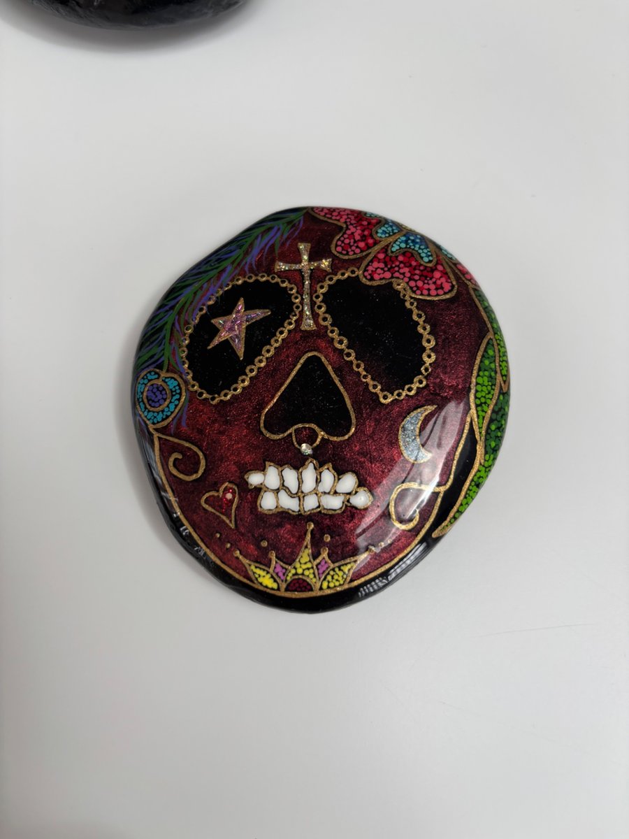 Sugar skull painted rock