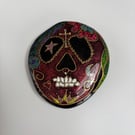 Sugar skull painted rock