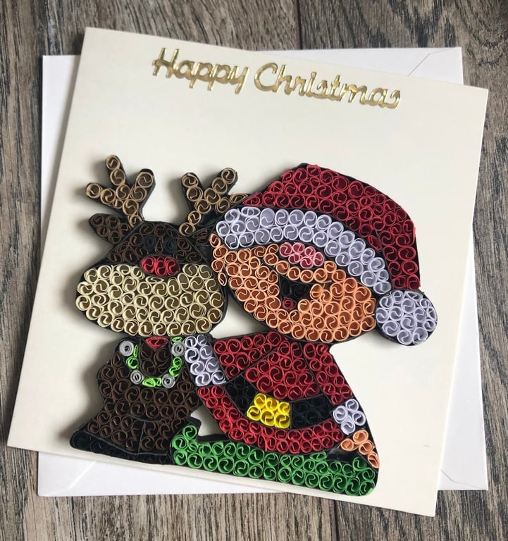 Stunning handmade quilled Boy and Reindeer 