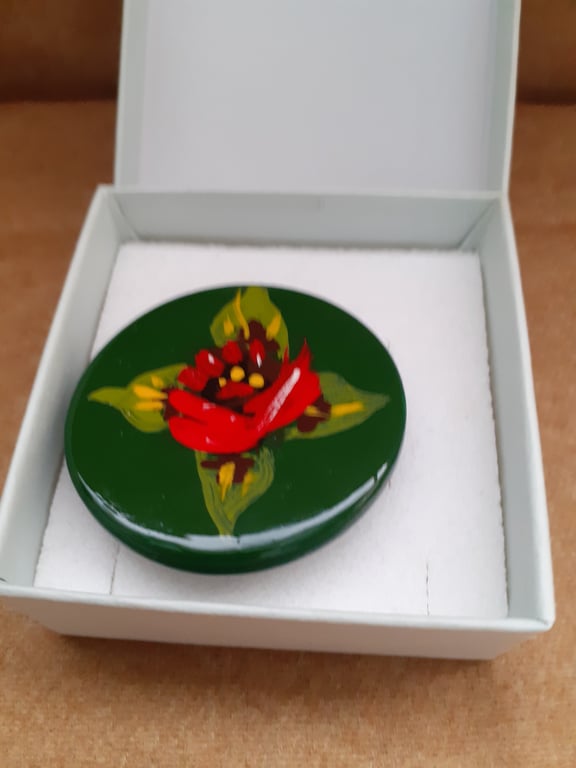 Green ceramic brooch with red canal art style rose