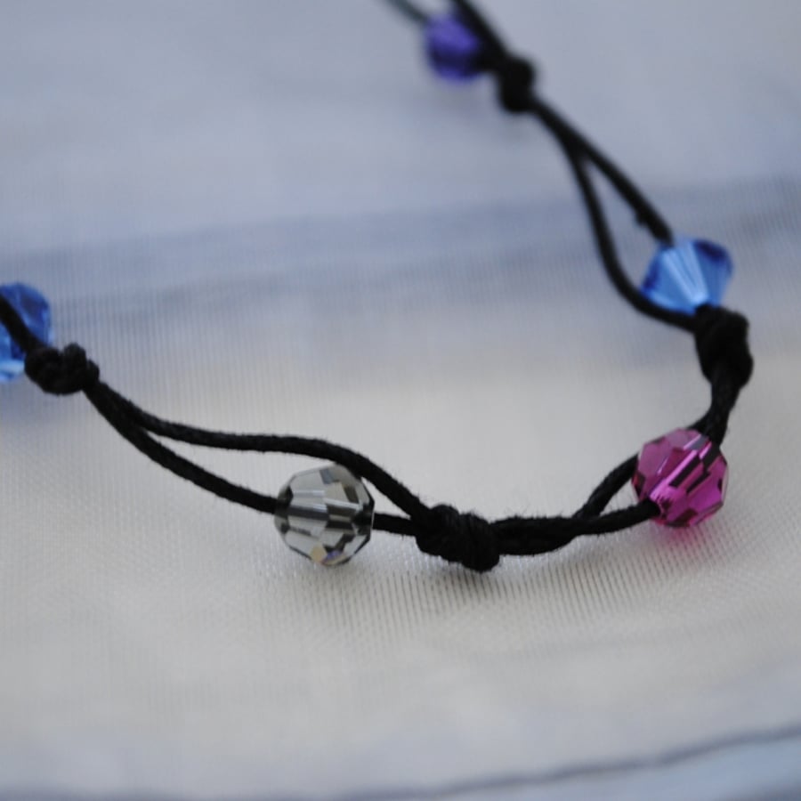 Sale-Swarovski crystal & black cord necklace, blue sapphire, purple, fuchsia