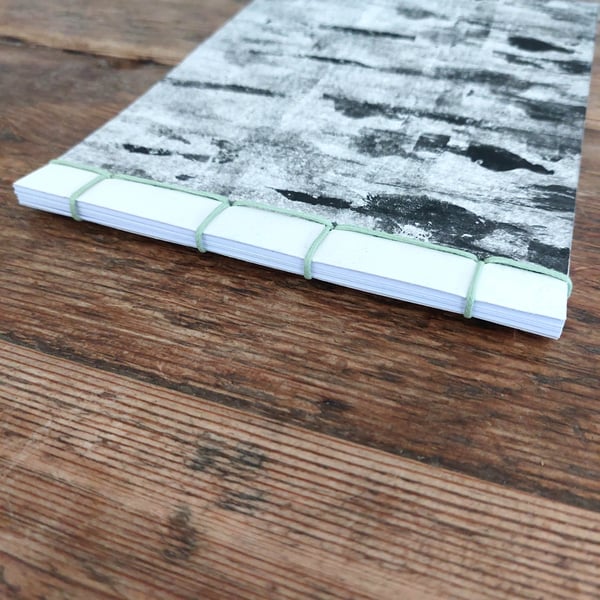 Handmade note book approx 40 pages