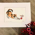 Mounted Christmas cat with bauble reduction lino print 