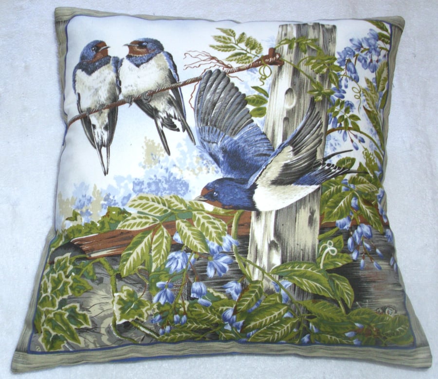 Bright Blue Swallows on a Summer day cushion