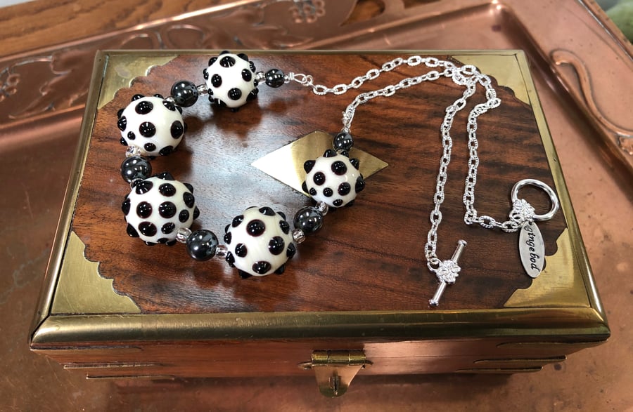 Black and ivory lampwork glass necklace