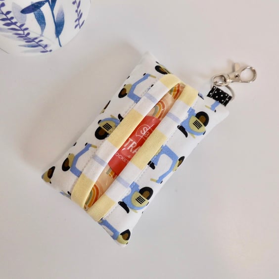 Key ring tissue tidy in motor scooter print with a clasp
