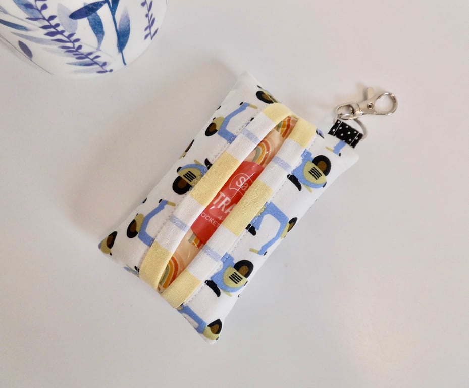 Key ring tissue tidy in motor scooter print with a clasp