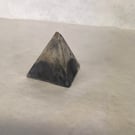 Pyramid made from traditional concrete mixtures indoor or garden ornament