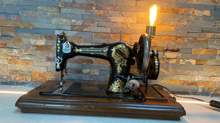 Vintage (1920s) up cycled Jones Family CS sewing machine into a table lamp.