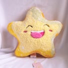 A smiling star cushion