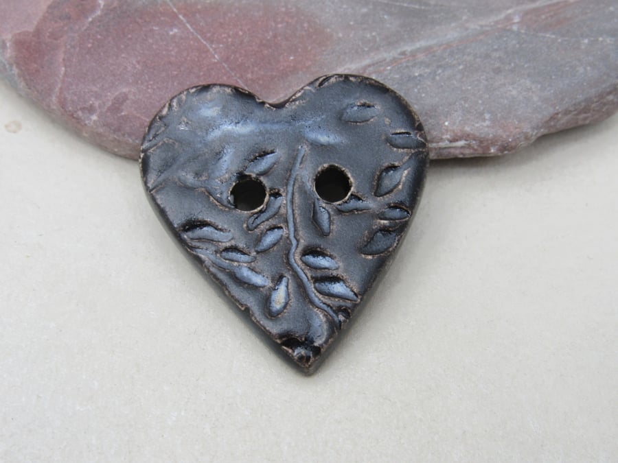 Medium Dark Earth Leaf Sprig Texture Heart Shaped Ceramic Button