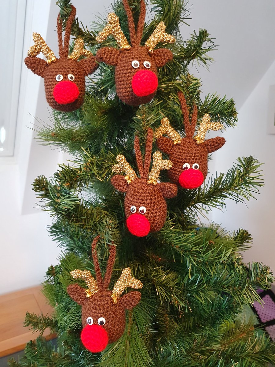 Crocheted reindeer decoration with gold antlers