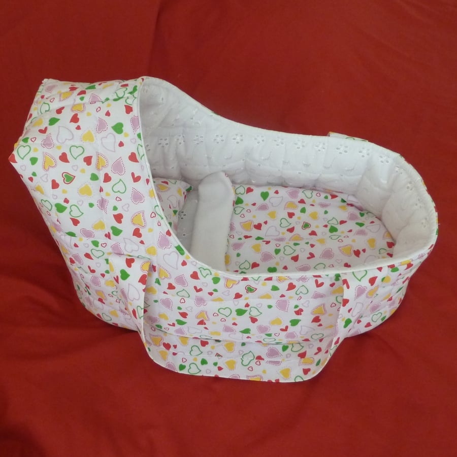  Multi-coloured Doll's Carry Cot