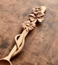 A unique hand carved wooden art spoon featuring relief carving on the handle - Image 4