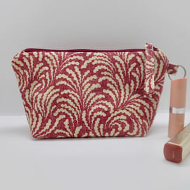 Make up bag in dark pink printed linen fabric