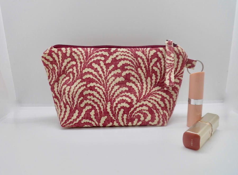 Make up bag in dark pink printed linen fabric