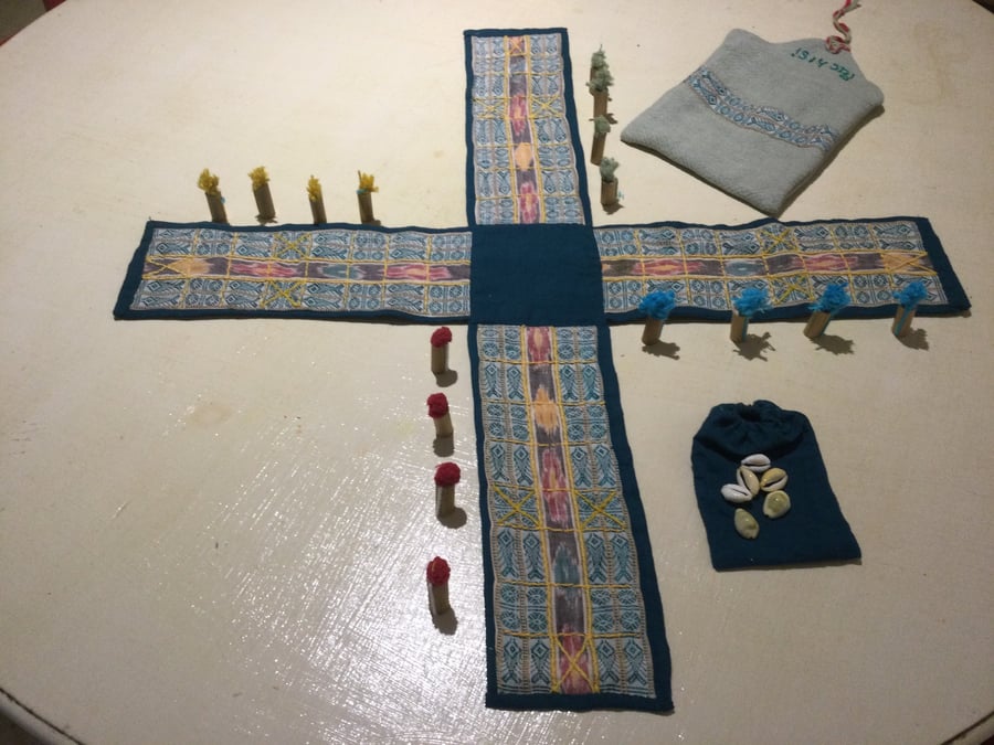 Ikat fish design Pachisi game with cowry shells