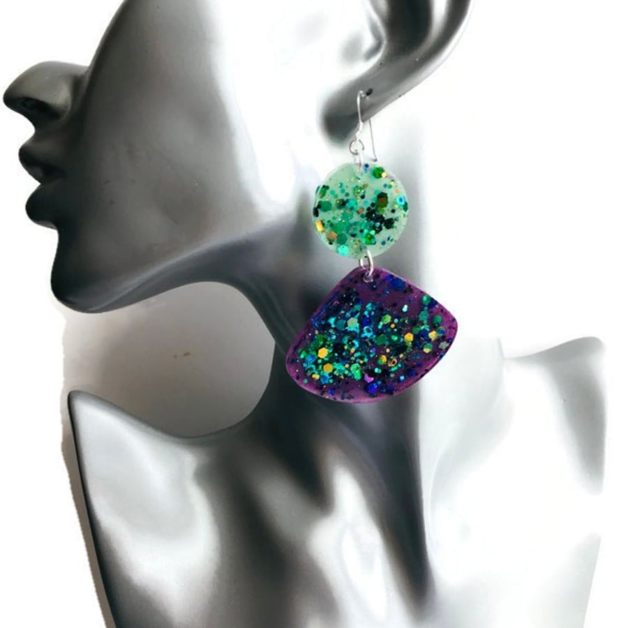 Green and purple glitter statement chandelier earrings on sterling silver.