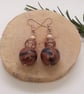 Conker brown and black dangly earrings with a bronze sheen - Image 4