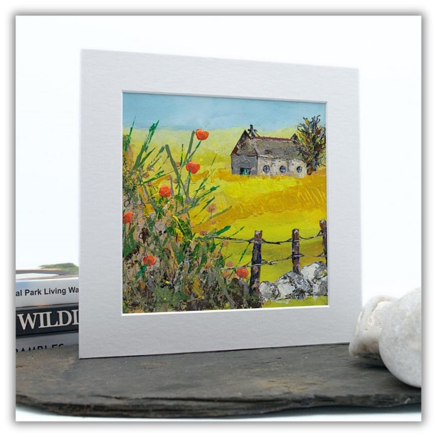 A small mounted painting - landscape - yellow fields - church - wildflowers