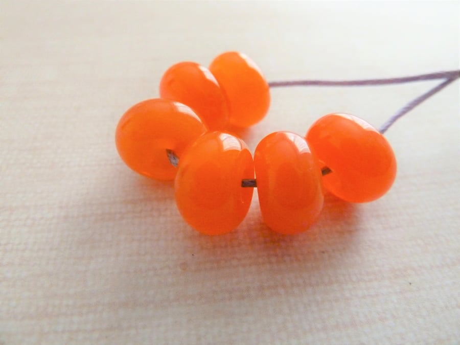 lampwork glass orange spacer beads