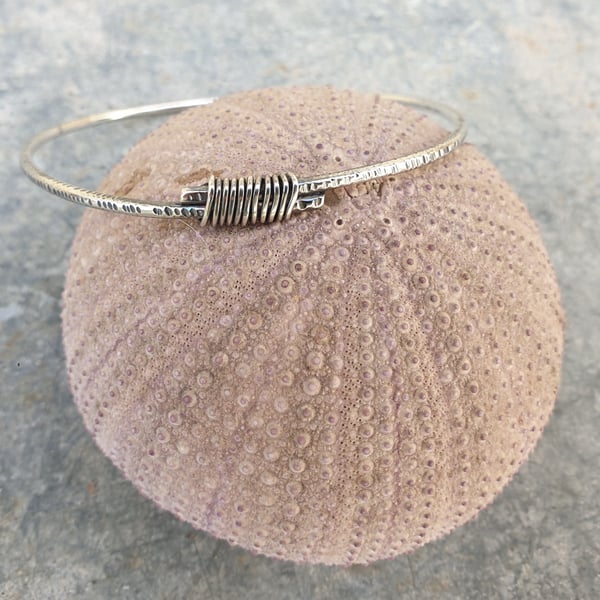Sterling silver textured bangle with wire wrapping