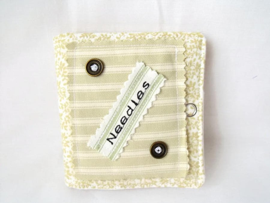 sewing needle keep safe book, pale green with brass buttons