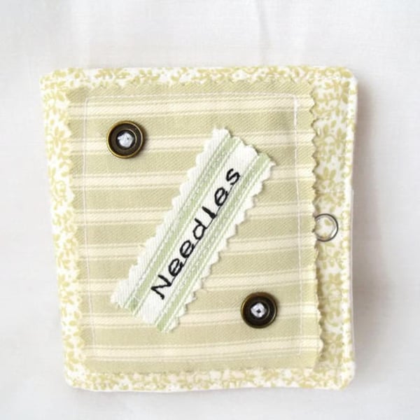 sewing needle keep safe book, pale green with brass buttons