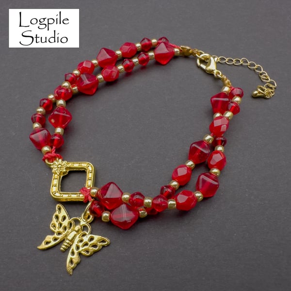 Red and Gold Bead Bracelet with Butterfly Charm