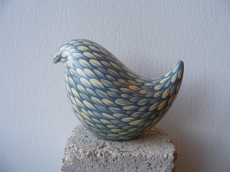 Painted bird (E) cream on pale blue