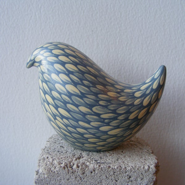 Painted bird (E) cream on pale blue