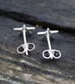 Tiny silver star stud earrings. - Image 3