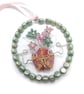 Pastel green and pink beaded and wire flower hanging decoration