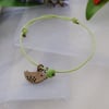 Apple green & copper bird friendship bracelet