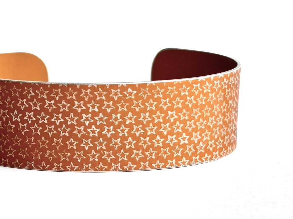 Star pattern aluminium cuff dark mustard