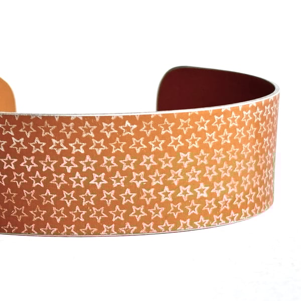 Star pattern aluminium cuff dark mustard